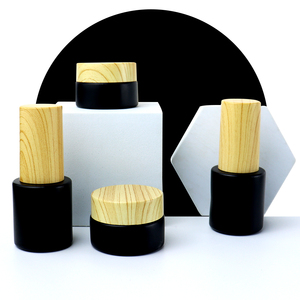Tarros de vidrio personalizados con acabado mate esmerilado negro de 50g, 30g, 15g, 10g, <span class=keywords><strong>5g</strong></span>, 10ml, 20ml, 50ml con tapas de bambú con textura de madera. - Product Image 5