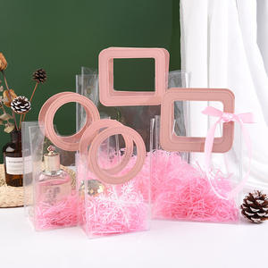 Bolsas de regalo transparentes con asas Bolsas de envoltura de plástico reutilizables Bolsas de compras transparentes para fiestas de Navidad Favores Bodas - Product Image 1