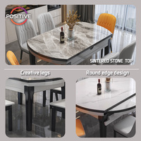 Ensemble de table à manger ovale extensible moderne chaises rembourrées en pierre frittée pour cuisine ouverte espaces à manger table à manger