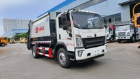 Camion compacteur de déchets Howo 9 m³ 4x2 à chargement arrière automatique, petit compresseur de déchets avec moteur et pompe, à vendre