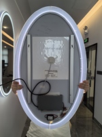 Miroir de courtoisie de salle de bain à LED ovale de style moderne sans cadre, anti-buée, rétroéclairé par capteur tactile, interrupteur mural pour miroir de bain