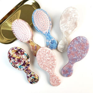 Peigne à cheveux portable haut de gamme fait main en acétate multicolore, avec coussin d'air ovale, pour massage, design mignon pour filles - Product Image 1