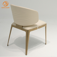 Chaise de salle à manger en acier inoxydable de luxe léger, avec dossier en cuir véritable et motif tressé artisanal