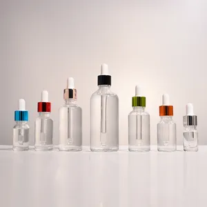 Flacon compte-gouttes en verre transparent pour huiles essentielles avec couvercle en plastique personnalisé d'usine 5ml 10ml 15ml 20ml 30ml 50ml 100ml