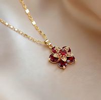 Nouvelle chaîne de clavicule rotative avec fleurs en zircon coloré micro-incrustées, style européen et américain, tendance et à la mode