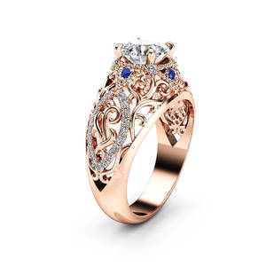 Anello da Donna con Zircone Blu Floreale Intarsiato, Design Elegante e Traforato, Gioiello da Dito Versatile per Uso Quotidiano e Feste, Regalo - Product Image 1