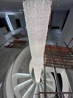 Lustre moderne pour escalier de villa duplex avec lampe LED en cristal de verre rotatif ajouré, design extra long