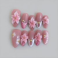 Faux ongles à presser nude rose, forme amande moyenne, avec motifs 3D fleur de lys rose, French, léopard, zèbre, perles dorées, faits main