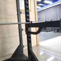 Machine Smith multifonctionnelle pour salle de sport commerciale, équipement d'entraînement de musculation avec demi-rack pour squats