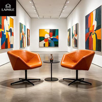Fauteuil de loisirs rotatif contemporain à forme géométrique en cuir PU, fauteuil pivotant pour appartement, hôtel, mobilier de réception