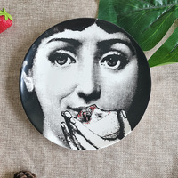 Assiette en céramique pour décoration murale de salon, motif visage humain, idéale pour la maison et comme présentoir à bijoux de bureau, disponible en import.