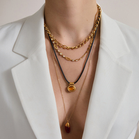 Collier pendentif J&D Designer Vintage en acier inoxydable plaqué or 18 carats PVD, avec pendentif en ambre naturel translucide