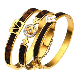 XIXI Acier Inoxydable 18K Gold Plated Stainless Steel Women Zircon Leather Four Leaf Clover Fashion Jewelry Bracelets Bangles