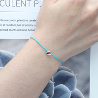 Conception simple et unique perles rouges en argent 925 corde bleu clair frais noeud coulissant bijoux de mode