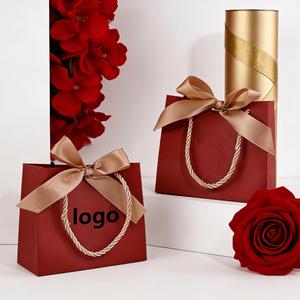 Factory Direct Customizable Burgundy Paper <b>Bag</b> With Ribbon & Handle Festive Ideal for Wedding & Chinese New Year Gift Packaging - Product Image 1