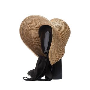 Chapeau de soleil élégant et luxueux Laurie pour femme, nouveau chapeau d'été en paille de blé, chapeau de plage pour vacances en bord de mer avec ruban à nouer - Product Image 1