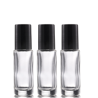 Flacon de parfum en verre transparent de 5 ml et 10 ml avec bouchon noir et applicateur à bille