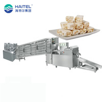 Machine industrielle entièrement automatique pour la fabrication de nougat, ligne de production de nougat pour la fabrication et le traitement du chikki aux cacahuètes