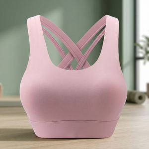 Sujetador deportivo rosa de alta sujeción con espalda cruzada para mujer, para yoga, fitness y entrenamiento, de tela elástica transpirable con logo frontal - Product Image 1