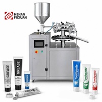 Machine semi-automatique à ultrasons pour le remplissage et le scellage de tubes souples en plastique et aluminium pour graisse, dentifrice, cosmétiques et emballages.