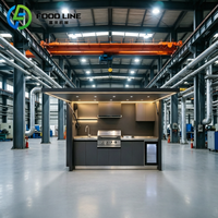 Cuisine extérieure avec barbecue à gaz, îlot de cuisson et accessoires