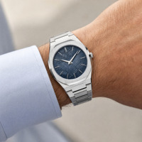 Montre pour homme avec logo personnalisé, bracelet intégré en acier inoxydable de luxe, cadran bleu croisé, lunette octogonale, quartz ultra fin, 5 ATM