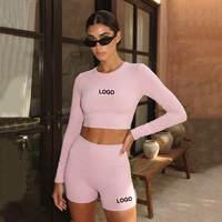 Fabricant d'ensembles de vêtements de yoga et de sport personnalisés de couleur unie, fournisseur de vêtements de sport effet seconde peau, haut court à manches longues et short cycliste