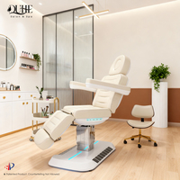 Lit de beauté électrique de luxe avec base LED, lit de massage en cuir, lit de soin du visage et des cils avec éclairage pour esthéticienne