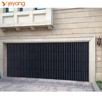 Porte de garage sectionnelle en aluminium à finition bois grainé personnalisée pour villa et maison