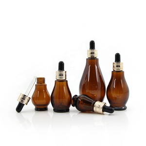 Flacon compte-gouttes <span class=keywords><strong>en</strong></span> verre ambré <span class=keywords><strong>en</strong></span> forme de <span class=keywords><strong>gourde</strong></span> de 10 ml à 100 ml, conteneur pour huile essentielle et sérum, emballage personnalisé pour soins de la <span class=keywords><strong>peau</strong></span> avec bouchon à vis et logo sur mesure - Product Image 3
