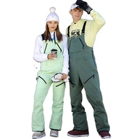 Pantalon de ski coupe-vent chaud 100 % polyester pour adultes (hommes et femmes) avec bretelles, idéal pour le snowboard et le ski, combinaison de ski