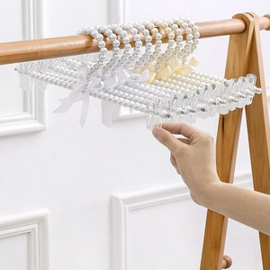 Cintres pour pantalons en perles <span class=keywords><strong>Porte</strong></span>-vêtements en plastique avec nœud papillon avec organisateur à clips pour ranger les robes Chemises Pantalons Jupes dans le placard des chambres à coucher - Product Image 6