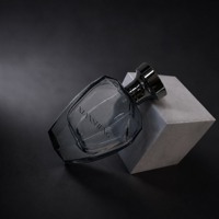 Flacons de parfum de luxe personnalisés 100 ml en verre facetté vides avec bouchon en alliage de zinc et emballage en boîte OEM ODM Fabricant
