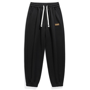 Pantalon à jambes larges avec logo personnalisé pour hommes en automne et en hiver et pantalon de sport ample droit en velours pour sous-vêtements masculins populaires - Product Image 1