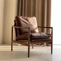 Fauteuil de détente en bois massif et cuir PU de style mid-century pour chambre et salon, design durable et écologique