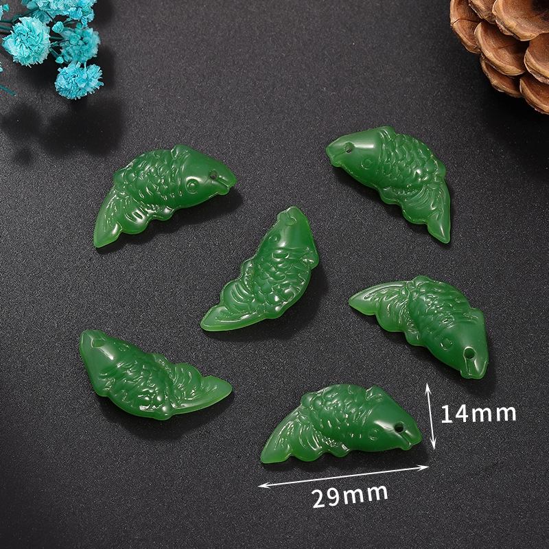 11 petits poissons vert foncé 14*29mm