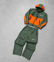 Ensemble survêtement homme Y2K streetwear coupe-vent à capuche color block avec pantalon cargo et poches zippées pour l'extérieur – Vente en gros personnalisée