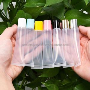 Maxfree Empty 15ml Plastic <b>Clear</b> Lip Balm & Lip <b>Gloss</b> Squeeze Tube Packaging with Screen Printed Custom Logo Gold/Silver Top Cap - Product Image 4