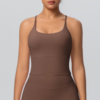 Soutien-gorge de sport moulant en nylon double face couleur unie à bretelles croisées pour la course, le fitness et le yoga pour femme