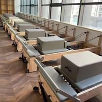 Reformer de Pilates Comercial de Madera de Arce de Alta Calidad, Telescópico, Duradero, con Logotipo de Cuero Personalizado, Cumple con las Normas del Reino Unido