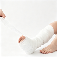 Attelle jetable en polyester, bande de plâtre orthopédique, consommable médical synthétique en fibre de verre activée par l'eau pour le soutien des fractures