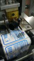 Machine d'impression semi-automatique, pour bouteilles plates
