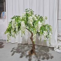 Grand arbre artificiel de glycine tombante, feuillage vert réaliste, fleurs blanches pour la décoration de lieux événementiels
