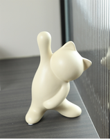 Ornements de chat en céramique lisse style crème, sculptures de chatons en porcelaine mate chaleureuse, décorations esthétiques douces pour la maison et le bureau