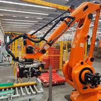 Robot palettiseur automatique à quatre sacs, bras robotisé pour l'empilage automatisé, palettiseur robotisé pour ligne d'emballage, robots articulés