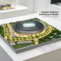 Maquette d'architecture de stade ovale de grande taille avec toit en diamant foncé, ouverture centrale verte, structure annulaire, éclairage