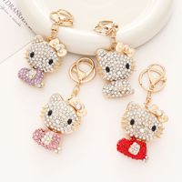Nouveau porte-clés transfrontalier en alliage de zinc avec strass, motif chat mignon, exquis, pour sacs et clés de voiture, petit cadeau