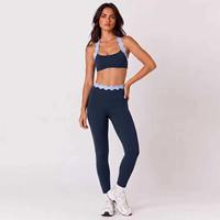 Ensemble de yoga sexy pour femmes, dos nu, col halter, avec soutien-gorge de sport à bords festonnés et pantalon taille haute, couleurs contrastées, tenue de sport pour la gym et le fitness