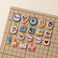 Nouveaux pendentifs breloques en forme de fleur, de botte, de cœur et de coquille, avec impression artistique effet goutte d'huile, accessoires DIY