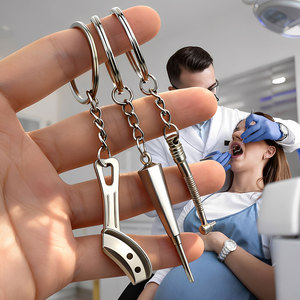 Porte-clés en forme de dent molaire dentaire en alliage de zinc dents porte-clés en métal simulé outils dentaires en métal pince dentaire dentiste porte-clés - Product Image 4